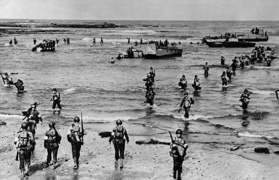 U.S. troops landing with Higgins assault boats on a beach in French Morocco, November 1942.By November 1942 the Allies had begun to secure the Atlantic. Stalin was demanding the opening of a second front against Germany to relieve the pressure on Russia. Britain and America were not yet prepared for a major continental invasion, so a compromise was reached in the North Africa campaign. The Allies landed on November 8, forced the capitulation of the Vichy regimes in Morocco and Algeria, and drove eastward against Rommel's German army.