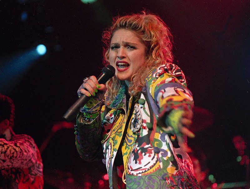 American singer Madonna performs during her "Virgin Tour" in 1985.