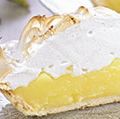 Slices of lemon pie topped with meringue.