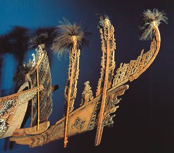 Canoe prow, wood, paint, and cassowary feathers, from Geelvink Bay, Irian Jaya; in the Basel (Switz.) Museum of Cultures.