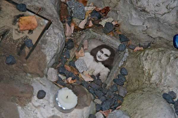 Anne Frank. Photo of Anne Frank at the children's memorial at the Okopowa Street Jewish Cemetery in Warsaw, Poland Nov. 8, 2008. Anne Frank was a Jewish wartime girl diarist who hid from the Nazis during World War II. WWII, Holocaust