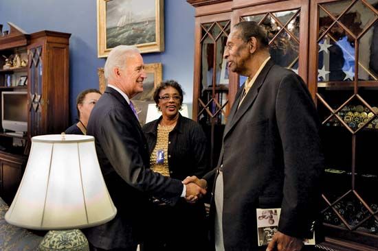 Earl Lloyd (right) meeting U.S. Vice Pres. Joe Biden in the White House, Washington, D.C., 2010.