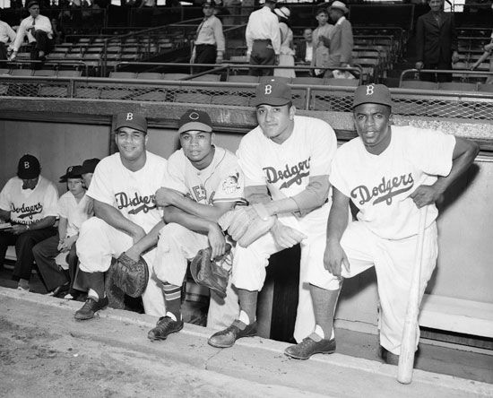 Roy Campanella, Larry Doby, Don Newcombe, and Jackie Robinson (left to right) in 1949 at Ebbets Field, where they became the first African Americans to take part in the All-Star Game.