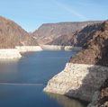 Lake Mead (the impounded Colorado River) at the Hoover Dam. The light-coloured band of rock above the shoreline shows the decrease in water level in the first few years of the 21st century.