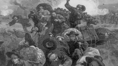 Miners of the Union Pacific Railroad Company shooting at crowd of fleeing Chinese miners working for the Union Pacific. The massacre of the Chinese at Rock Springs, Wyoming