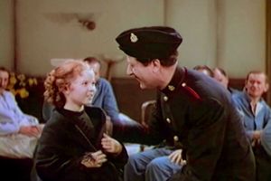 View Shirley Temple as Sara and Arthur Treacher as Bertie singing and dancing in a scene from the film “The Little Princess,” 1939