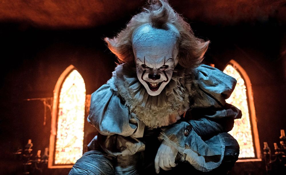 Still from the 2017 movie IT, Bill Skarsgard plays Pennywise the clown. Directed by Andy Muschietti