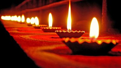 Diwali holiday lamps or candles, India. (Indian holiday, oil lamp, flame, candle, fire)