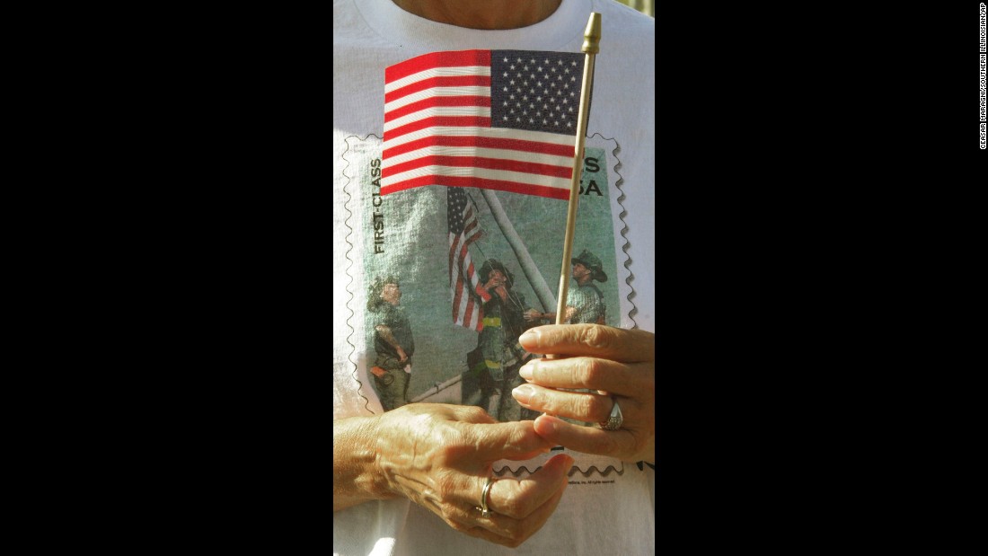 The image can also be found on T-shirts, like this one worn by Venita Bradford at a memorial service in Energy, Illinois, on September 11, 2002.