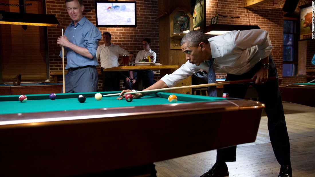 Playing pool with Gov. John Hickenlooper in Denver, Colorado, on July 8, 2014. 