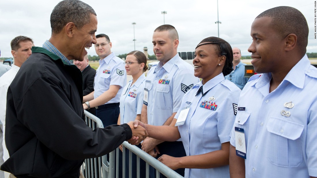 Greeting military personnel at Offutt Air Force Base near Omaha, Nebraska, on August 13, 2012. 