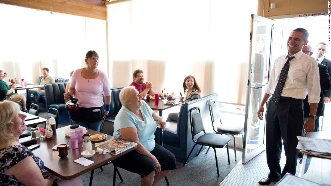 Reacting to a quip from a patron at the Gateway Breakfast House in Portland, Oregon, on July 24, 2012. 