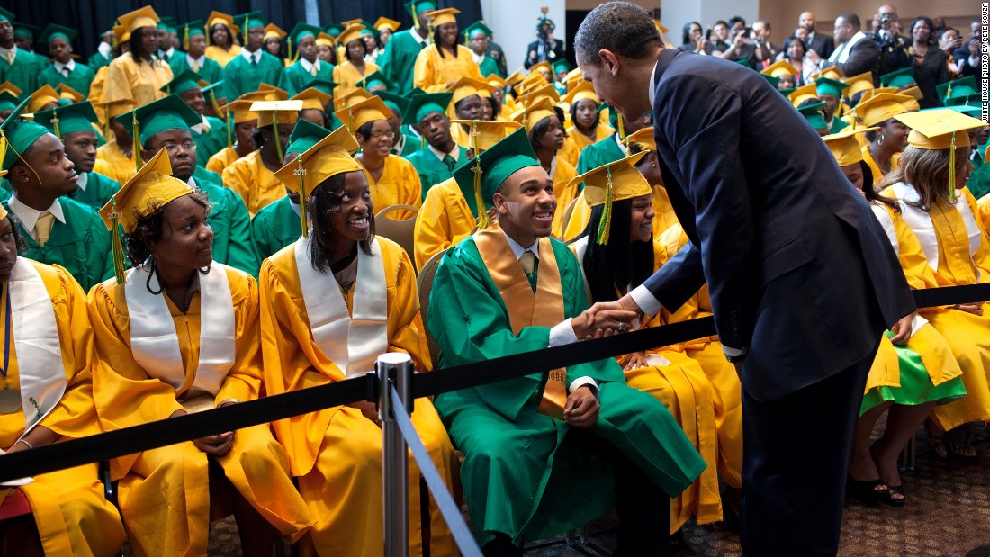 Shaking hands with Booker T. Washington students before their commencement ceremony in Memphis, Tennessee, on May 16, 2011. 