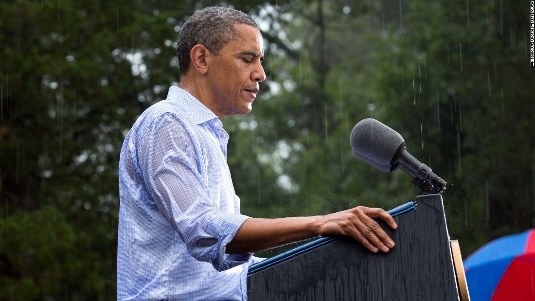 Speaking during a rainstorm in Glen Allen, Virginia, on July 14, 2012. Glen Allen is near Richmond.