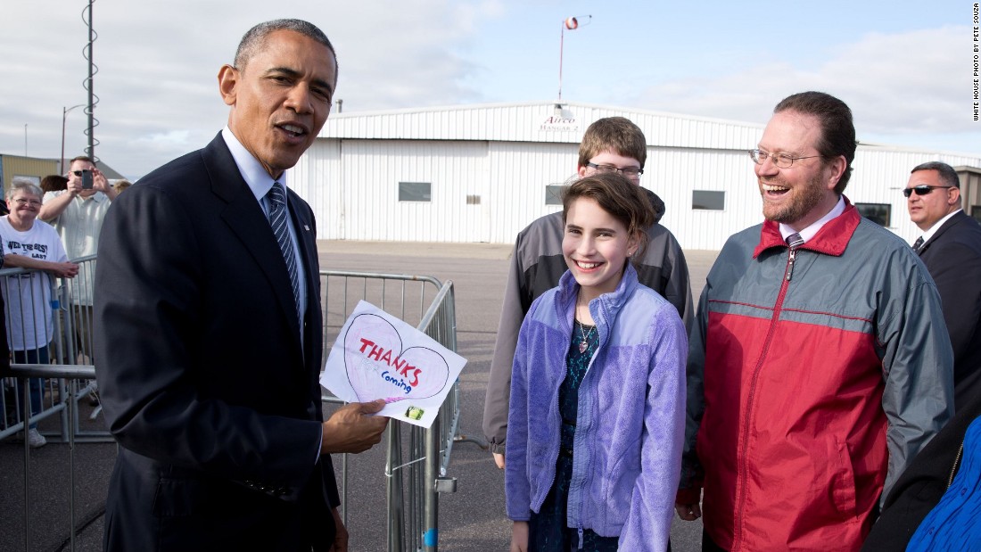 President Barack Obama, visiting Watertown, South Dakota, on Friday, May 8, shows off a note given to him by 11-year-old Rebecca Kelley. Rebecca had written him a letter asking him to visit South Dakota, which is the 50th state Obama has visited during his time in office. White House photographer Pete Souza highlights a picture from each state.