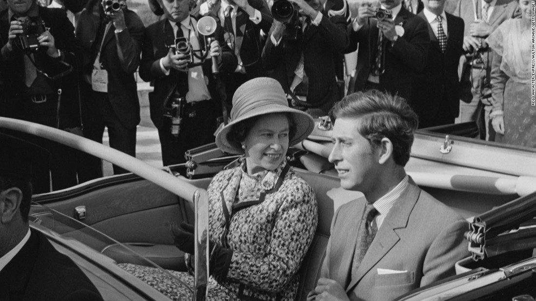 The Queen and Prince Charles seem to be enjoying their open-top car ride during a state visit to Avignon, France, in May 1972, three years after being invested with the title of Prince of Wales. 