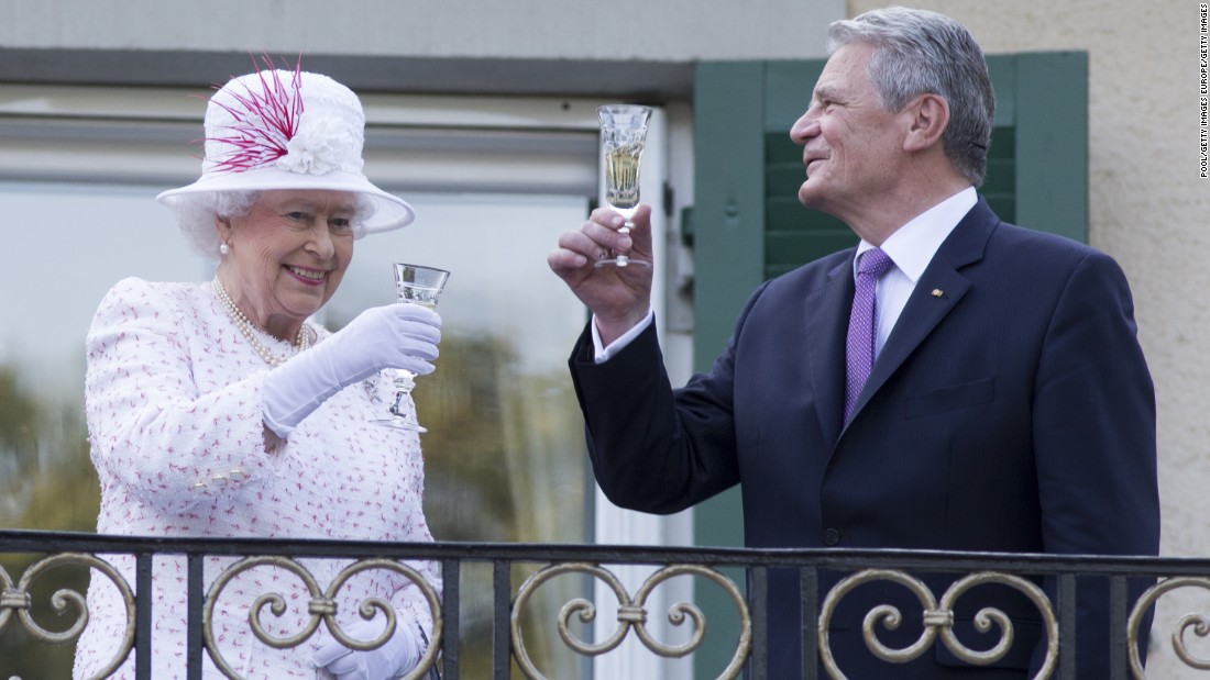 The Queen raises a glass with the President of Germany, Joachim Gauck, as they attend a garden party at the British Embassy residence on a &lt;a href=&quot;http://edition.cnn.com/2015/06/23/europe/uk-germany-queen-state-visit/&quot;&gt;state visit &lt;/a&gt;to the country on June 25, 2015 in Berlin. 