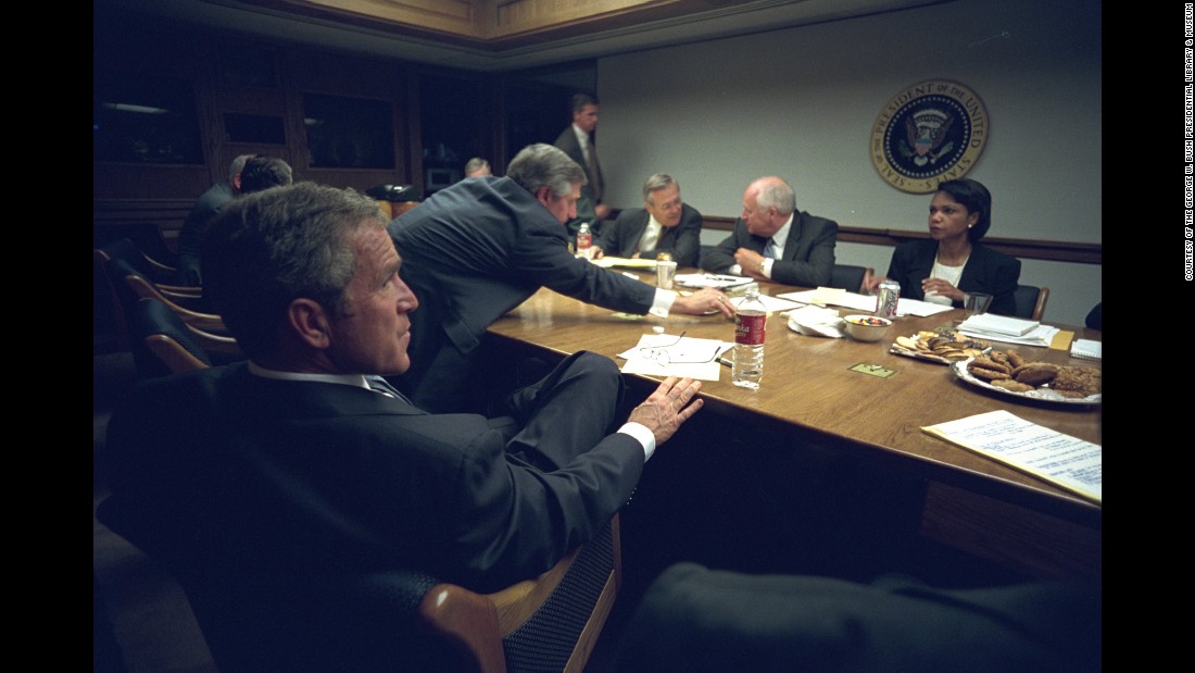 Bush meets with his staff after delivering his address. Want to see more? &lt;a href=&quot;http://www.cnn.com/2015/03/11/world/gallery/osama-bin-laden-rare-photos/index.html&quot;&gt;Rare photos&lt;/a&gt; offer look inside Osama bin Laden&#39;s Afghan hideout. 