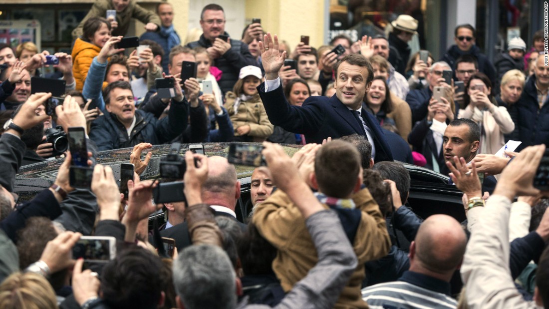 French presidential election candidate Emmanuel Macron leaves his home to go vote in Le Touquet, France. 