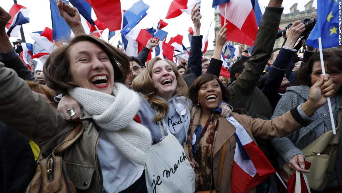 Supporters of Macron celebrate at the Louvre Museum in Paris on May 7.