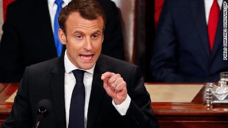 French President Emmanuel Macron speaks to a joint meeting of Congress on Capitol Hill in Washington, Wednesday, April 25, 2018. Standing behind him are Vice President Mike Pence and House Speaker Paul Ryan of Wis. (AP Photo/Pablo Martinez Monsivais)