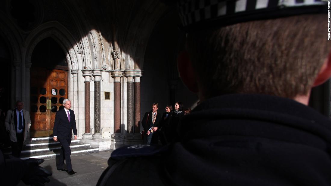 Assange leaves the High Court in London in December 2011. He was taking his extradition case to the British Supreme Court.