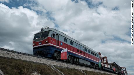 TOPSHOT - A picture taken on June 23, 2018 shows locomotive at the construction site of Standard Gauge Railway (SGR) during the Presidential Inspection of the SGR Nairobi-Naivasha Phase 2A project in Nairobi, Kenya. - The SGR phase 2A project is an 120km extensiton of the Monbasa-Nairobi SGR project (Phase 1) with the longest railway bridge in the country, 5.8km Super Major Bridge, constructed across Nairobi National Park. (Photo by Yasuyoshi CHIBA / AFP)        (Photo credit should read YASUYOSHI CHIBA/AFP/Getty Images)