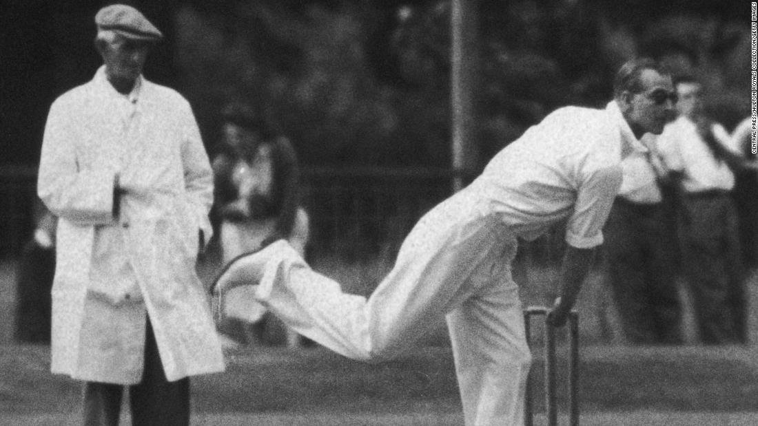 Prince Philip plays in a village cricket match in July 1949.