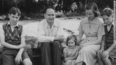 Australian physicist Eric Burhop (1911 - 1980), secretary to the Atomic Scientists&#39; Committee of the Association of Scientific Workers, with his family at their home in Surbiton, London, 22nd July 1951. Burhop&#39;s passport has been cancelled by the British government due to his plans to travel to the Soviet Union. He is pictured with his wife Winifred and children (left to right) Graham, Annalise and Ian. (Photo by Fred Ramage/Keystone/Hulton Archive/Getty Images)