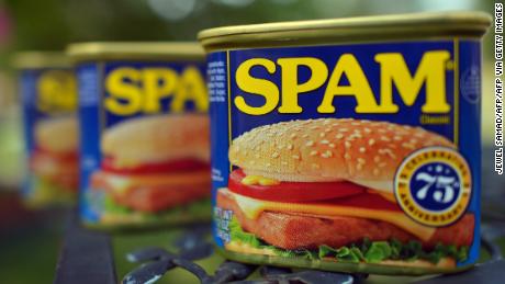 Cans of Spam meat made by the Hormel Foods Corporation are pictured in Silver Spring, Maryland, on July 5, 2012. Hormel&#39;s famous canned meat, which was born in Austin, has been a part of American&#39;s lives since 1937.  Spam, celebrating its 75th anniversary, its name a hybrid of the words &quot;Spiced&quot; and &quot;Ham,&quot; is a canned precooked meat product. AFP PHOTO/Jewel Samad        (Photo credit should read JEWEL SAMAD/AFP/GettyImages)