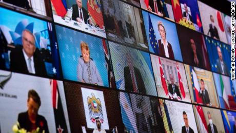 World leaders are seen on a screen during a climate change virtual summit from the East Room of the White House campus April 22, 2021, in Washington, DC. - US President Joe Biden on Thursday sharply ramped up US ambitions on slashing greenhouse gas emissions, leading new pledges by allies at a summit he hopes brings the world closer to limiting climate change. Putting the United States back at the forefront on climate, Biden told a virtual Earth Day summit that the world&#39;s largest economy will cut emissions blamed for climate change by 50 to 52 percent by 2030 compared with 2005 levels. (Photo by Brendan Smialowski / AFP) (Photo by BRENDAN SMIALOWSKI/AFP via Getty Images)