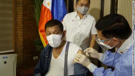 MANILA, May 3, 2021 -- Philippine President Rodrigo Duterte receives his first dose of China&#39;s Sinopharm COVID-19 vaccine in the Philippines, May 3, 2021. Duterte&#39;s longtime aide and senator Christopher Bong Go posted on social media a video showing Health Secretary Francisco Duque administering the vaccine in Duterte&#39;s left arm. (Photo by Xinhua via Getty) (Xinhua/Xinhua via Getty Images)