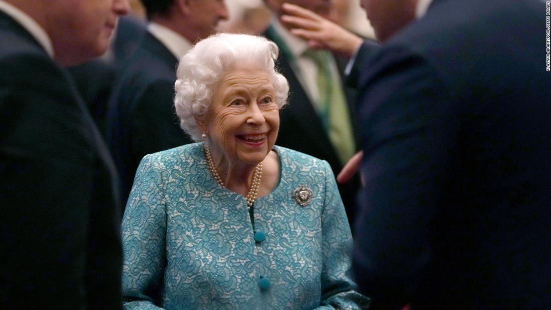 The Queen and British Prime Minister Boris Johnson, left, greet guests during a Windsor Castle reception for international business and investment leaders in October 2021.