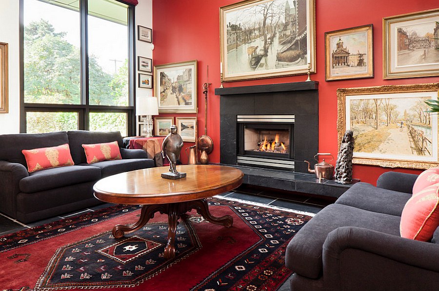 Beautiful framed wall art and the bold rug steal the show here [Design: Natural Balance Home Builders]