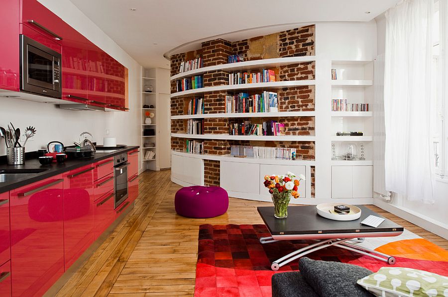 Creative way to highlight the curved brick wall in the living room [Design: Manuel Sequeira Architecte]