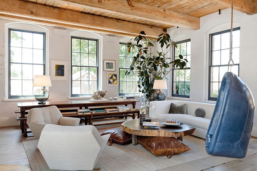 Natural wood and painted brick walls create a lovely contrast in the relaxing living room [Design: Huniford Design Studio]