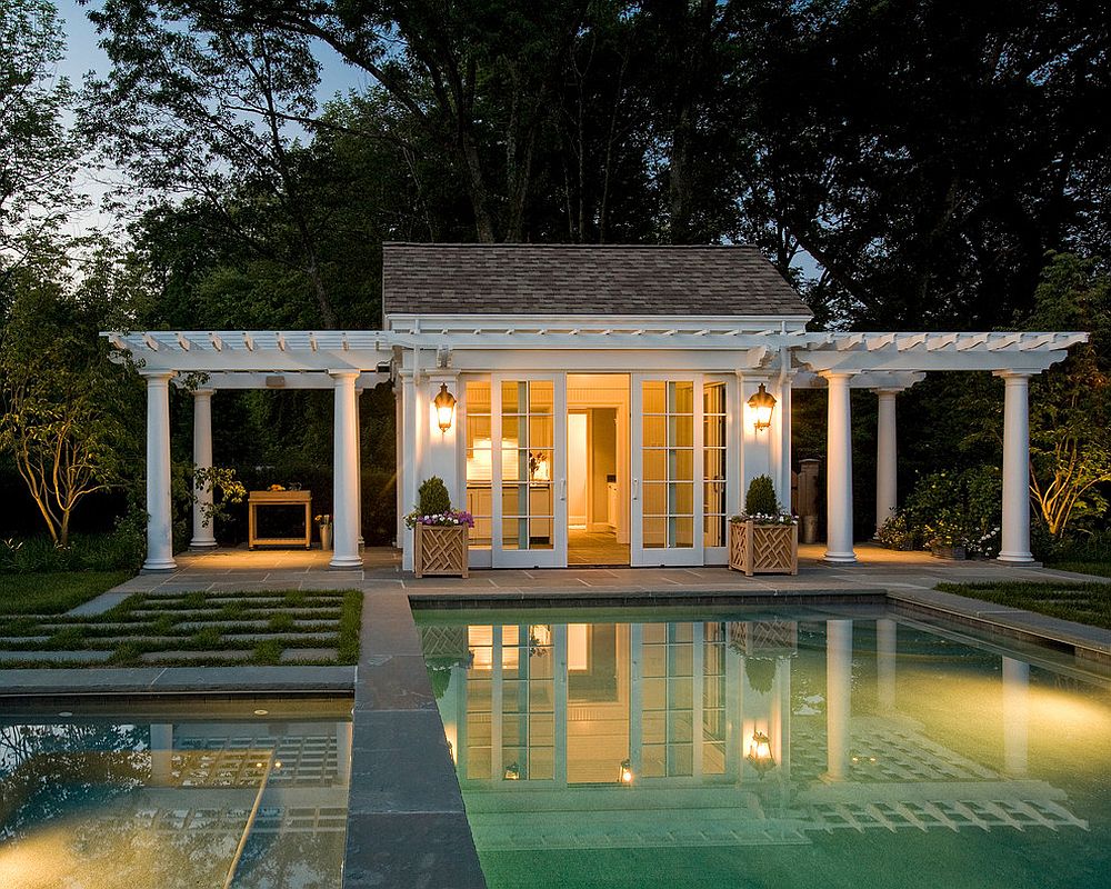 Twin pergolas add elegance to the classic pool house [Design: Merrimack Design Architects]