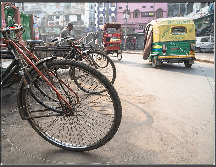 A street shot with the golden spiral composition grid overlayed