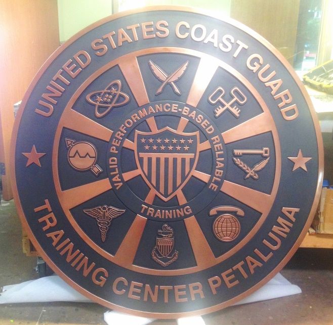 M7215  - Large 2.5-D Multi-level  Copper-plated  Plaque of the Crest of the US Coast Guard Training Center in Petaluma.