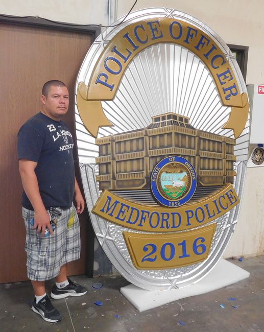 M7457 - Metallic Silver and Gold Painted Carved 3D High-Density-Urethane (HDU) Wall Plaque featuring the badge of  a Police Officer in Medford , Oregon.