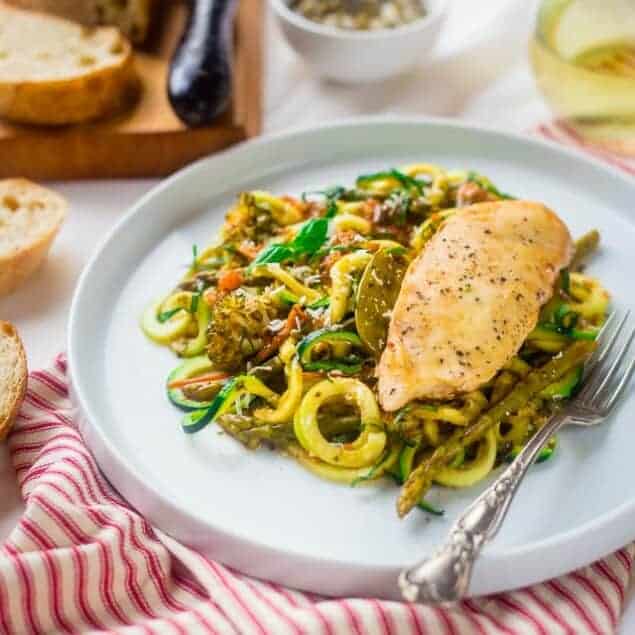 Slow Cooker Italian Chicken with Zucchini Noodles - This easy slow cooker Italian chicken is served over zucchini noodles for a light and healthy, gluten free, spring meal that's under 350 calories! | Foodfaithfitness.com | @FoodFaithFit