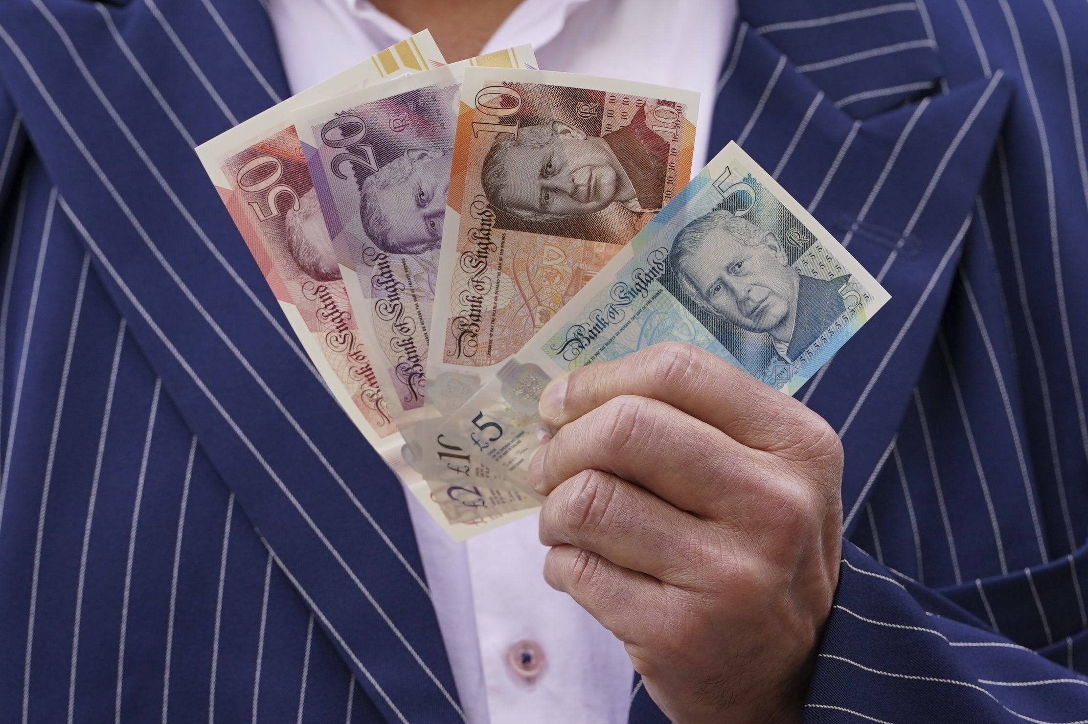 Newly released UK banknotes, featuring the portrait of King Charles were put into circulation on Wednesday. Photo: AP