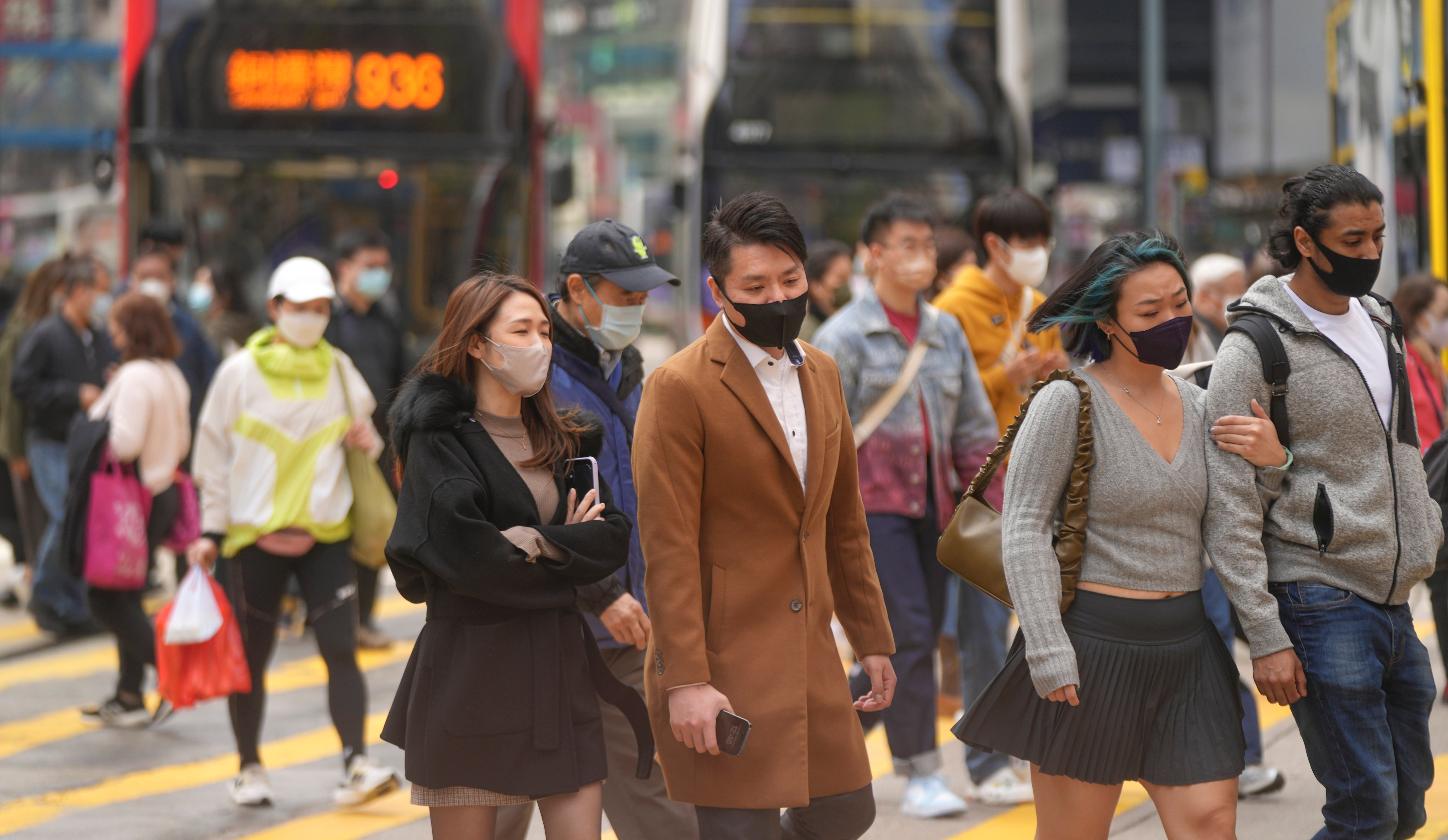 Hongkongers in Causeway Bay wear masks amid strict Covid-19 restrictions in February 2023. File photo: Sam Tsang
