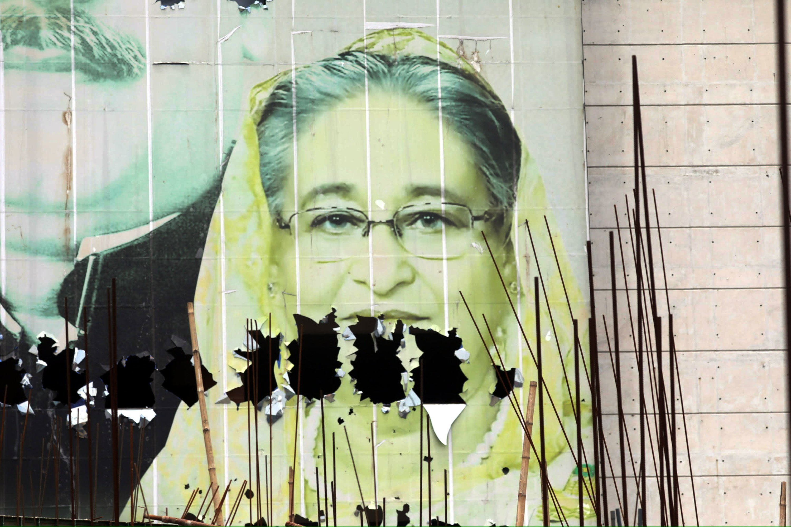 A vandalised image of Bangladesh’s Prime Minister Sheikh Hasina in the aftermath of her resignation, in Dhaka. Photo: EPA-EFE