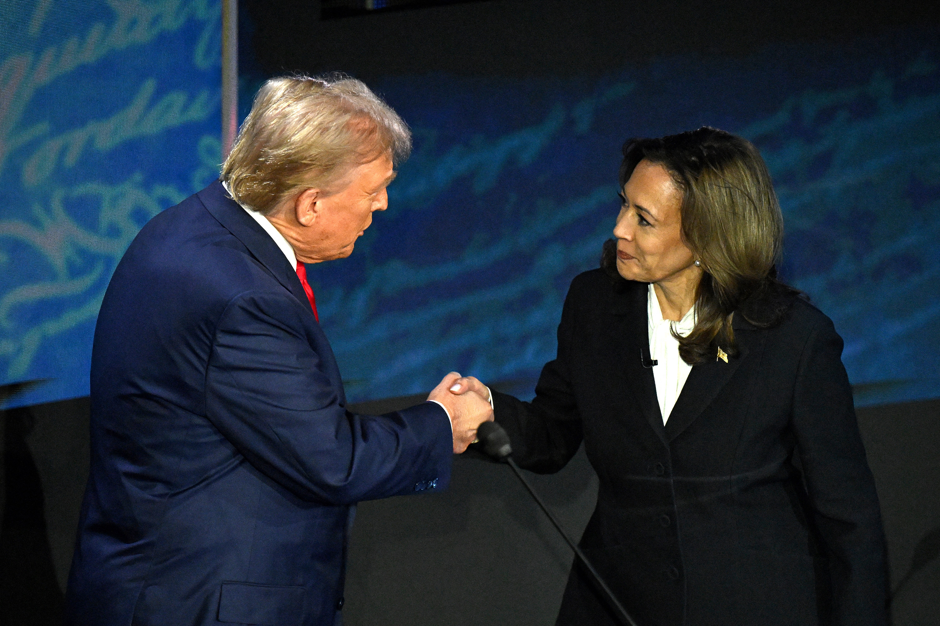 US Vice President and Democratic presidential candidate Kamala Harris (right) shakes hands with former US President and Republican presidential candidate Donald Trump during a presidential debate in Philadelphia on September 10. Photo: AFP/Getty Images/TNS