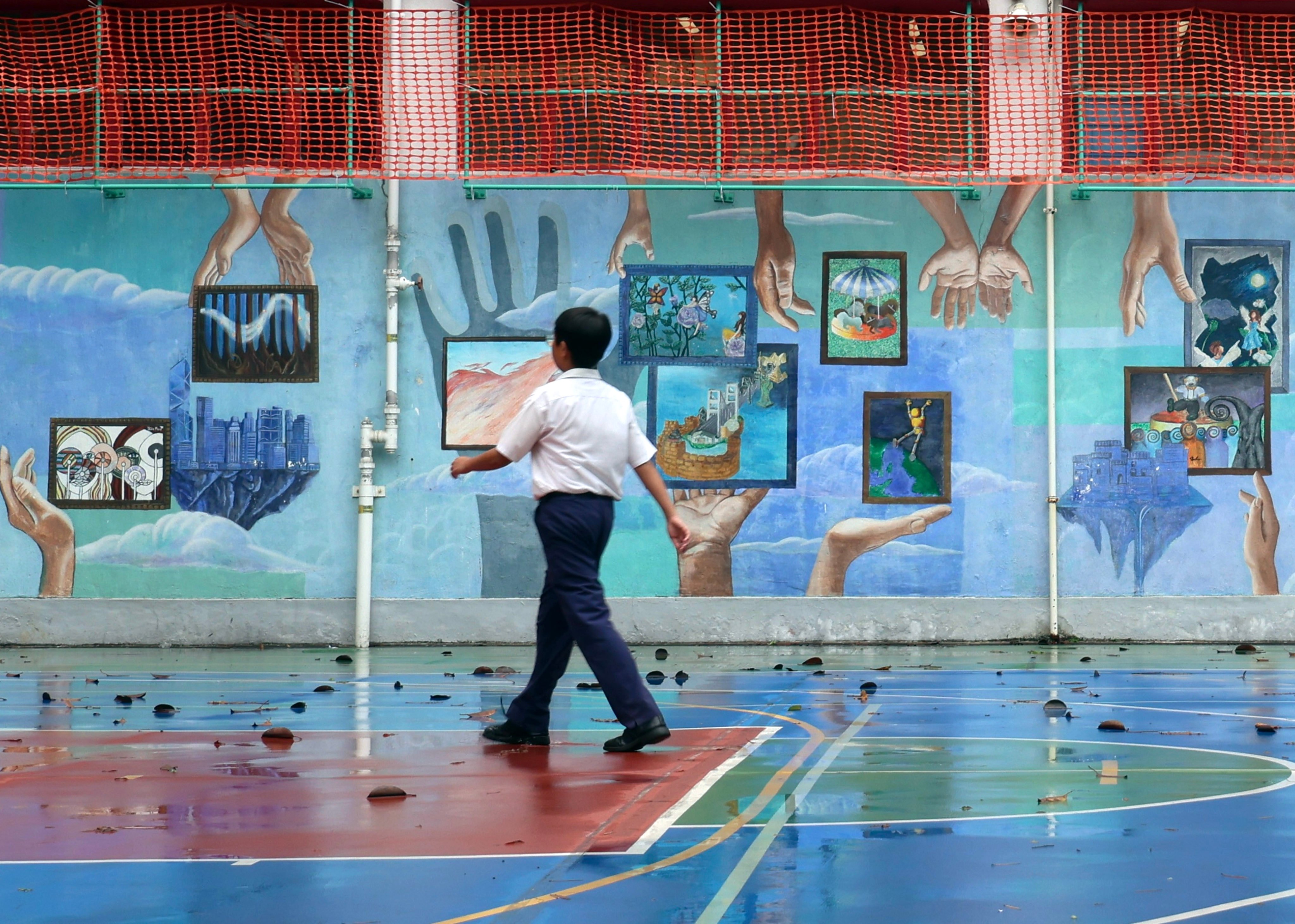 A student at a basketball court in Sha Tin on April 23. Photo: Jelly Tse