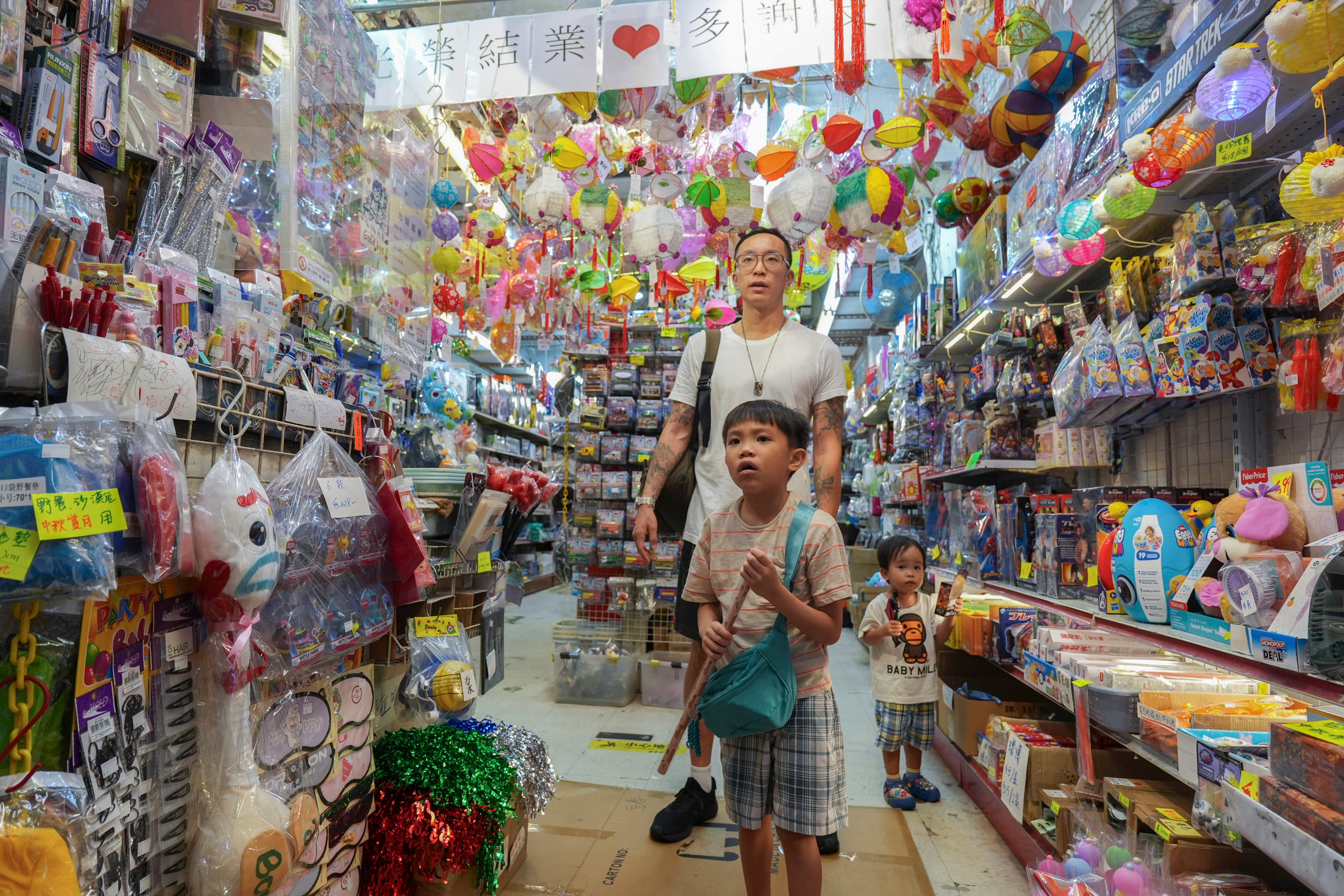 Shoppers seize the last chance to visit Yat Sing Toys at Tai Yuen Street, nicknamed “Toy Street”, in Wan Chai on September 6 as the shop prepares to close after some 30 years. Photo: Eugene Lee