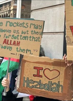 pro palestine protests london i love Hezbollah placards