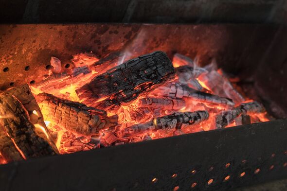 High Angle View Of Fire On Wood