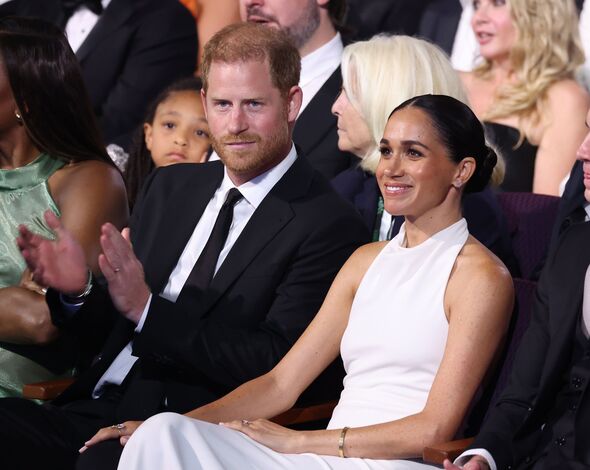 prince harry held back meghan markle king charles